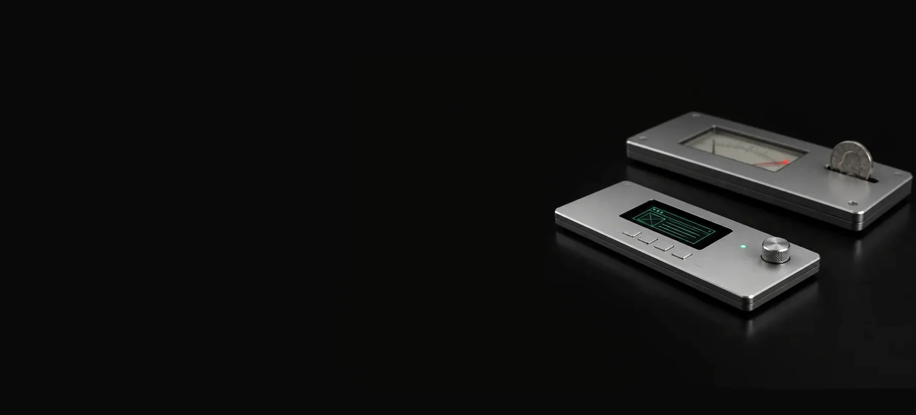 Two thin aluminium devices on a dark surface: one shows a page on an emerald screen, the other a meter with its needle pinned and a coin in its slot.