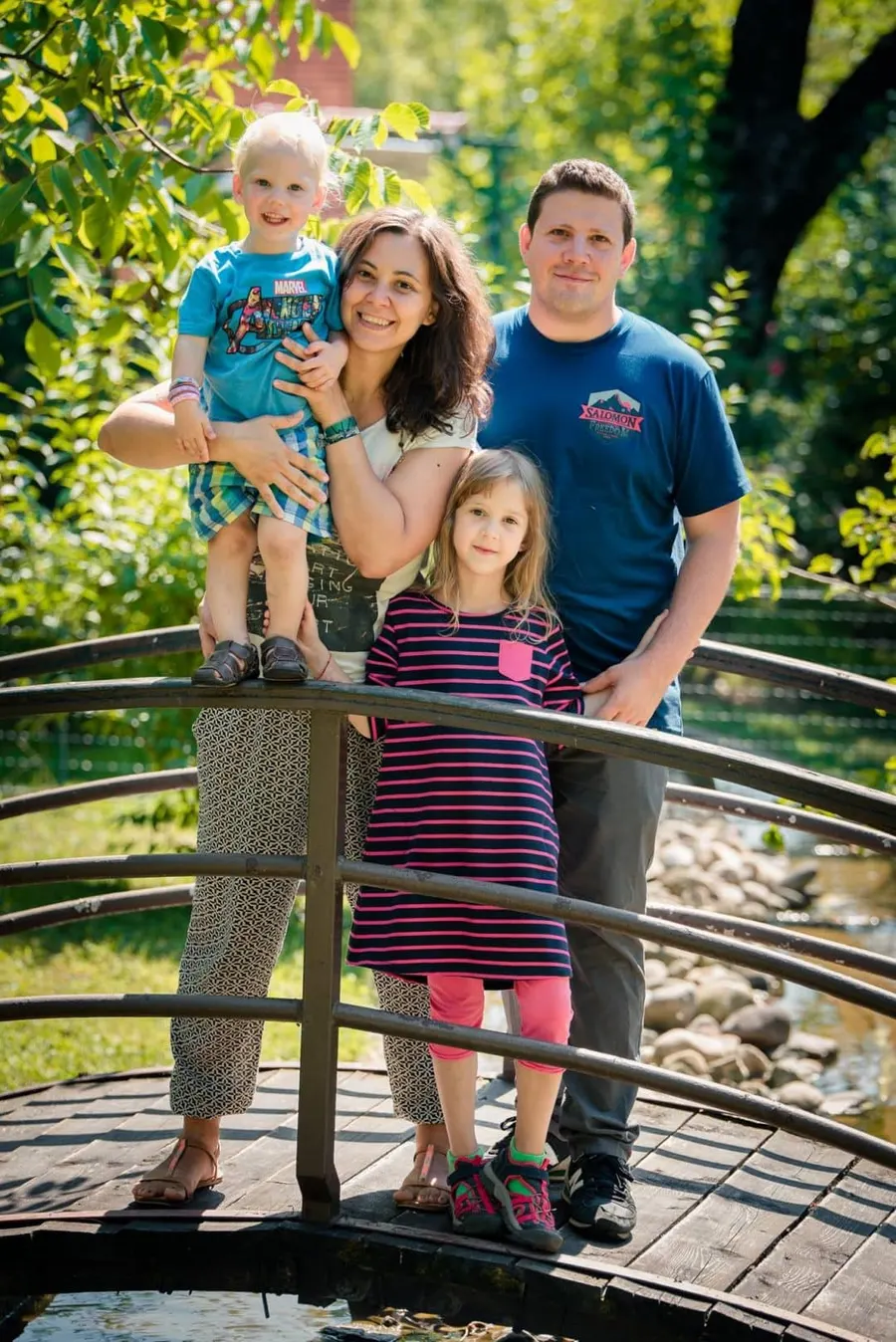 Iancu, Dana, Ioana and Mihai on a wooden bridge
