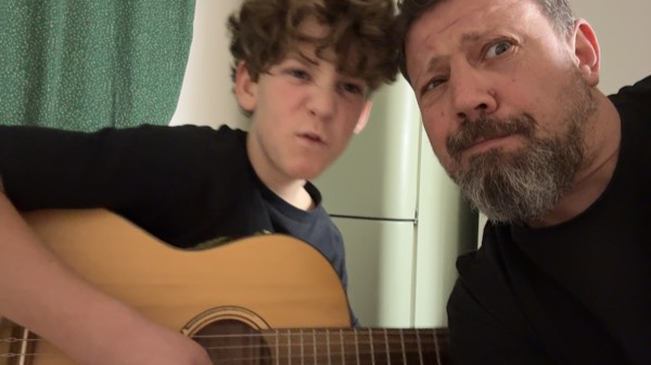 Mihai and his son Iancu singing happy birthday on WhatsApp